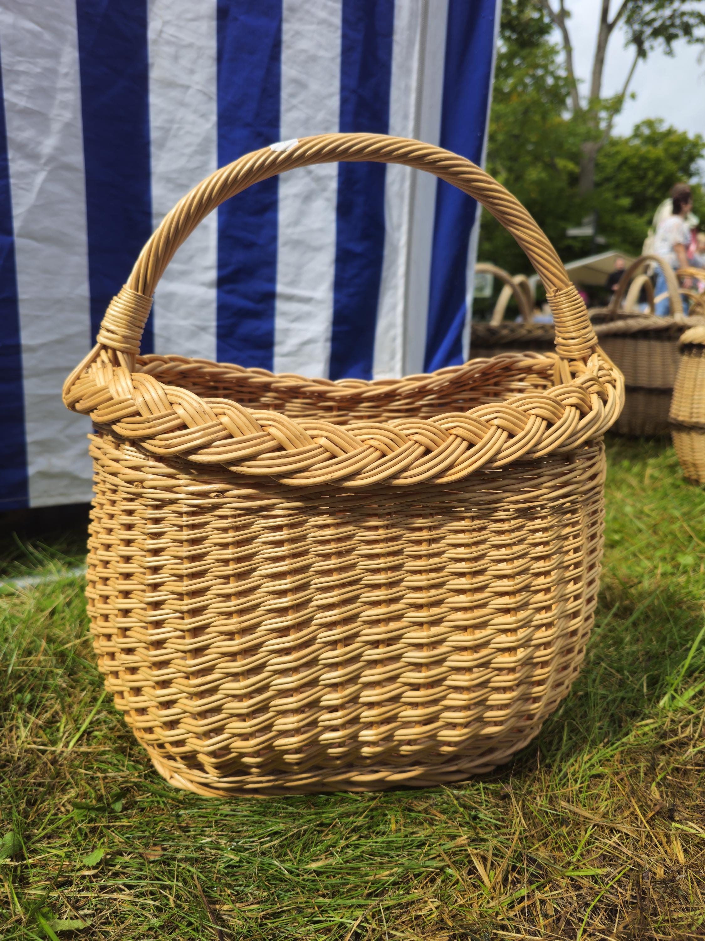 Wicker Basket with Braided Rim โ Handwoven Oval Gathering Basket